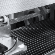 Core builder for microchannel heat exchangers