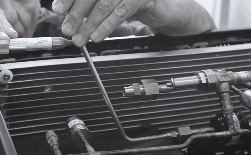 Serpentine condenser